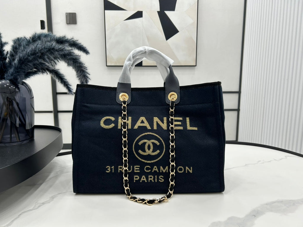 CHANEL DEAUVILLE LARGE 38 TOTE BAG IN BLACK CANVAS WITH GOLD EMBROIDERED LOGO