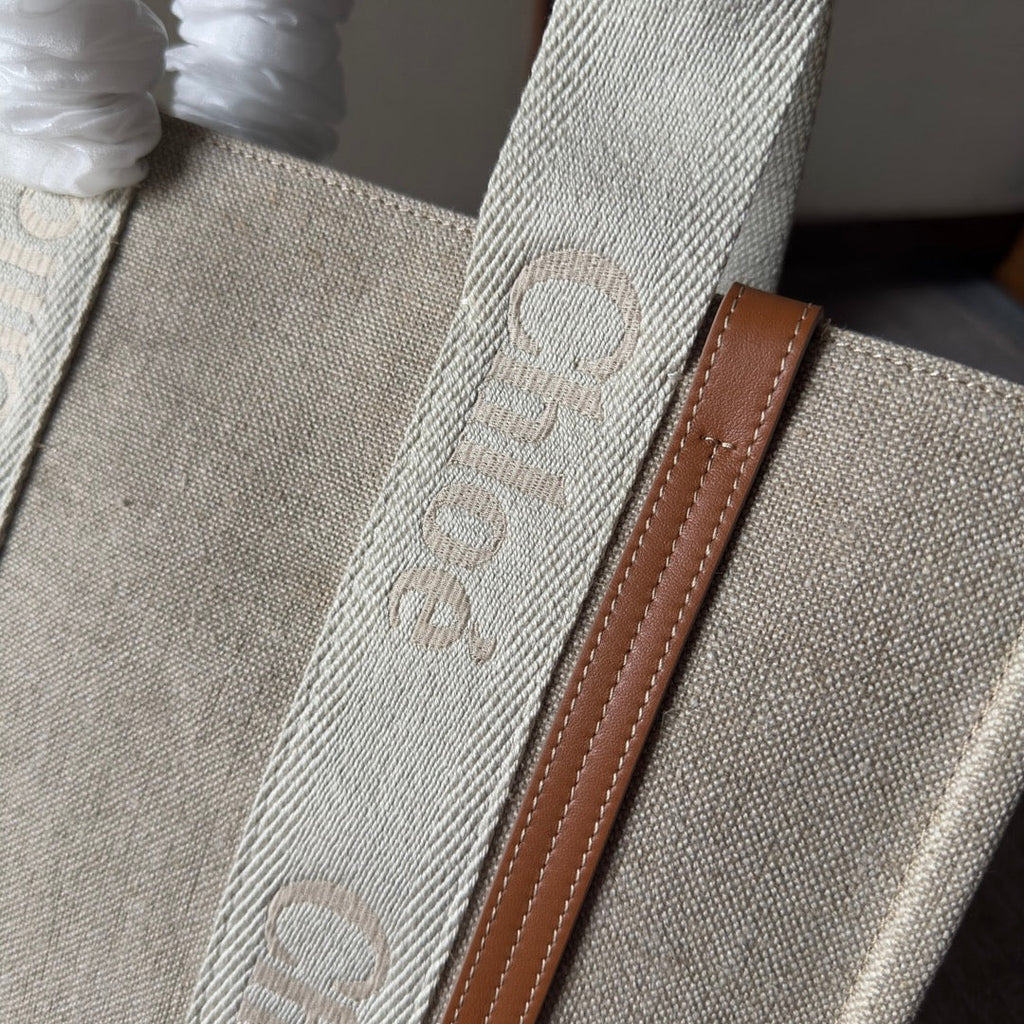 MEDIUM WOODY TOTE BAG 37 IN BEIGE LINEN CANVAS WEBBING LOGO EMBROIDERY BROWN CALFSKIN
