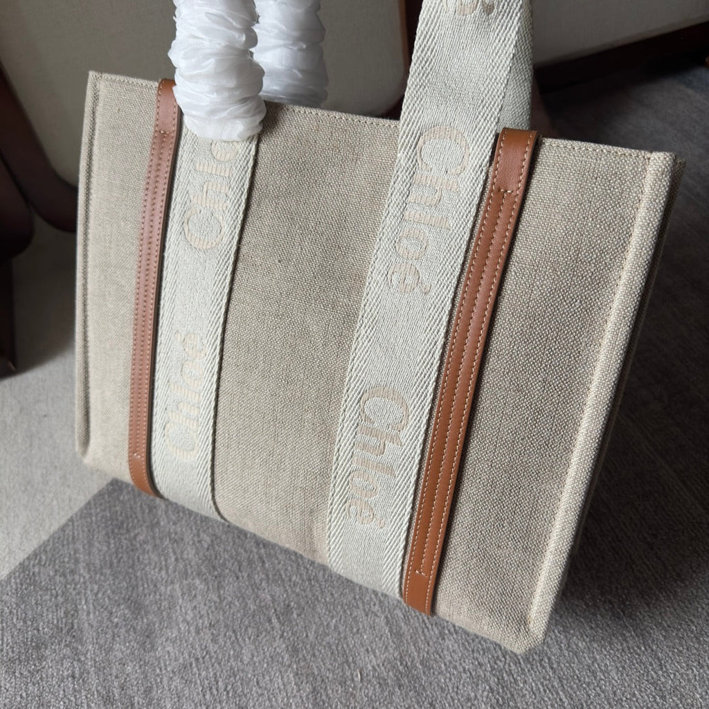 MEDIUM WOODY TOTE BAG 37 IN BEIGE LINEN CANVAS WEBBING LOGO EMBROIDERY BROWN CALFSKIN