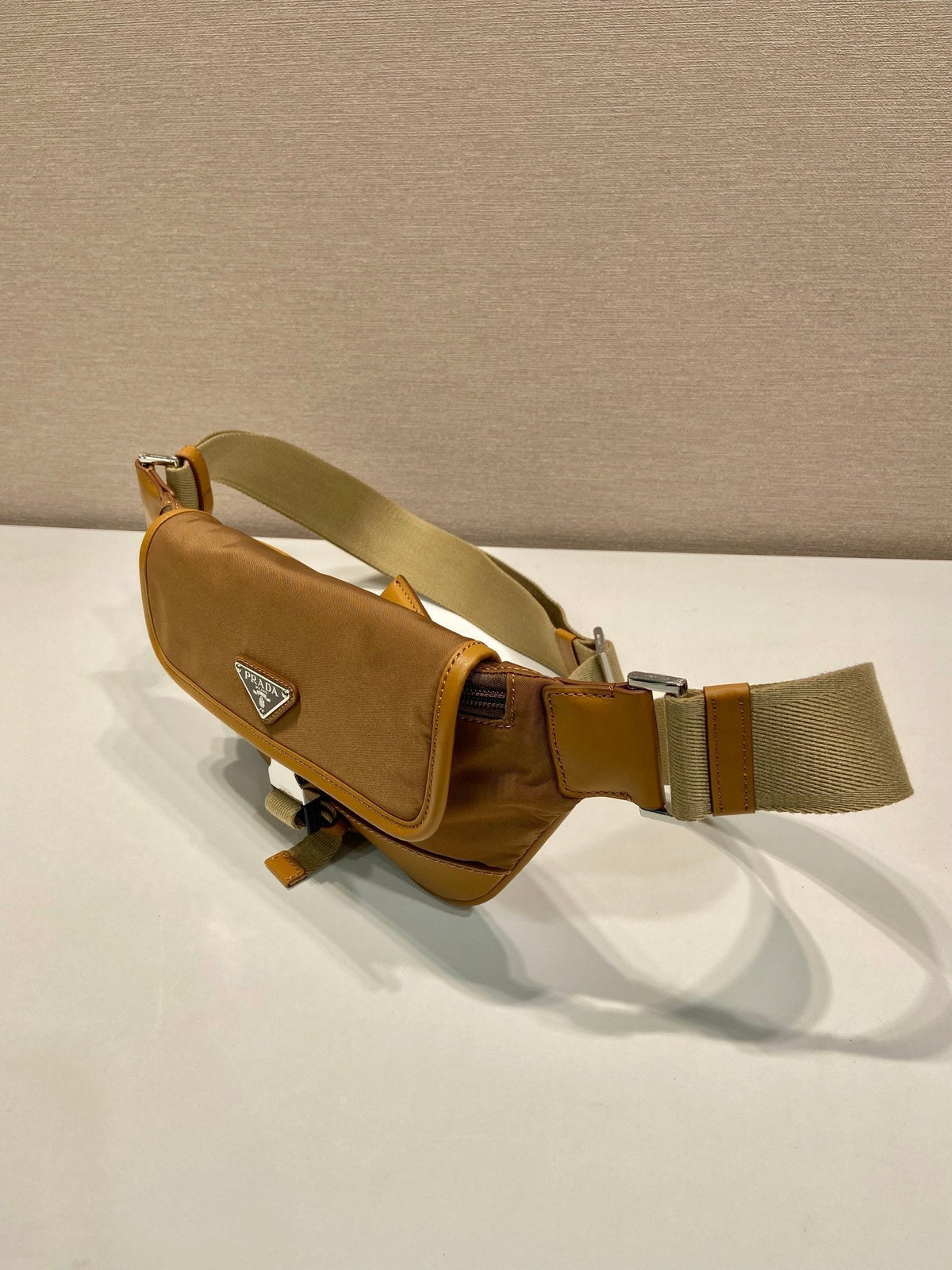 PRADA BELT BAG 18 IN SEPIA BROWN RE-NYLON AND CALFSKIN TRIM