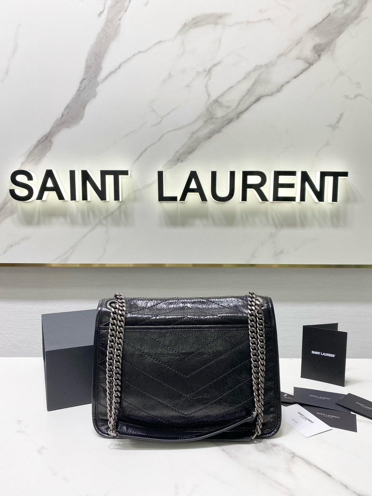 MEDIUM NIKI 28 IN BLACK CALFSKIN CHAIN BAG High-end