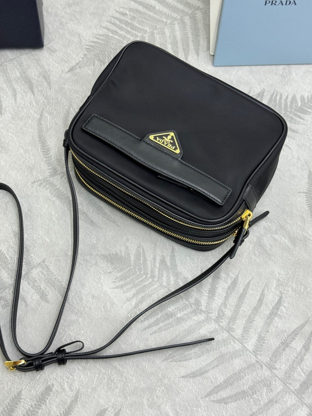 PRADA 25S RE-EDITION 1978 MINI 21 IN BLACK NYLON AND SAFFIANO CALFSKIN