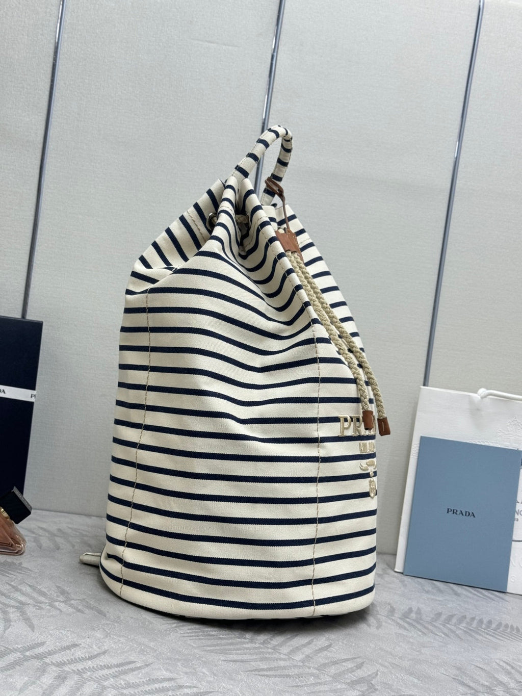 PRADA 25S DRAWSTRING BACKPACK 55 IN HORIZONTAL STRIPES CANVAS SILVER HARDWRE