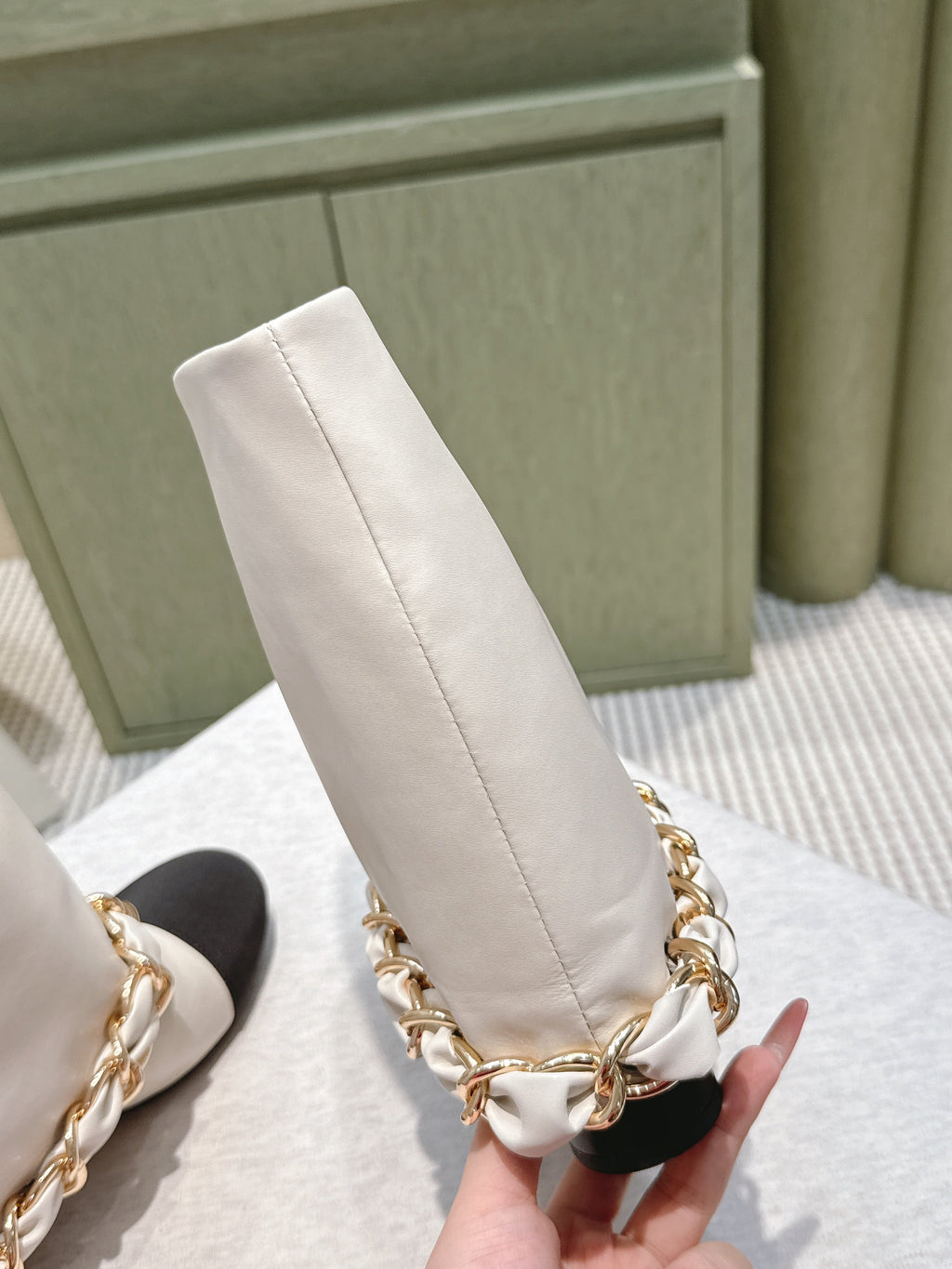 CHANEL 25S CALF-LENGTH BOOTS 45MM IN WHITE AND BLACK CALFSKIN GOLD HARDWARE