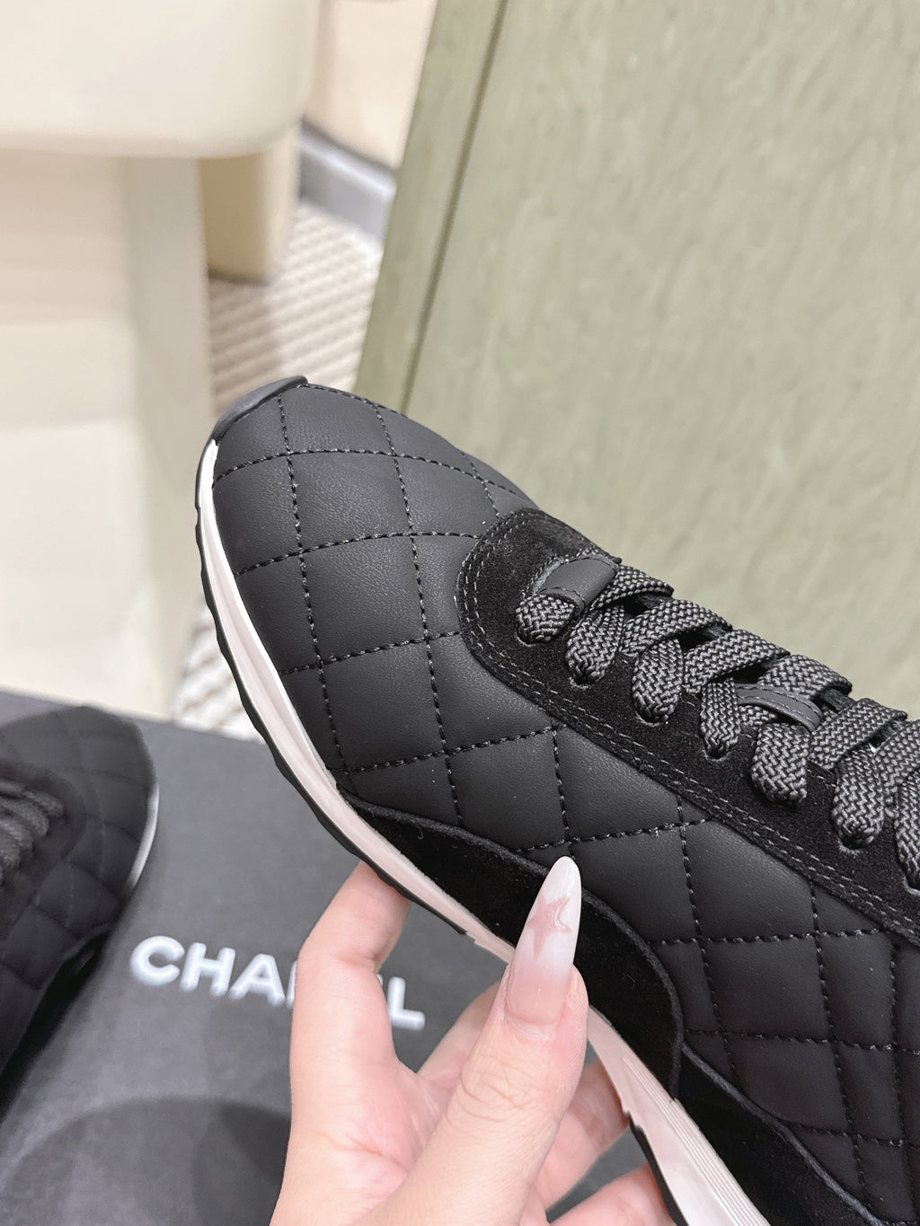 CHANEL 25S SNEAKERS IN BLACK CALFSKIN AND SUEDE