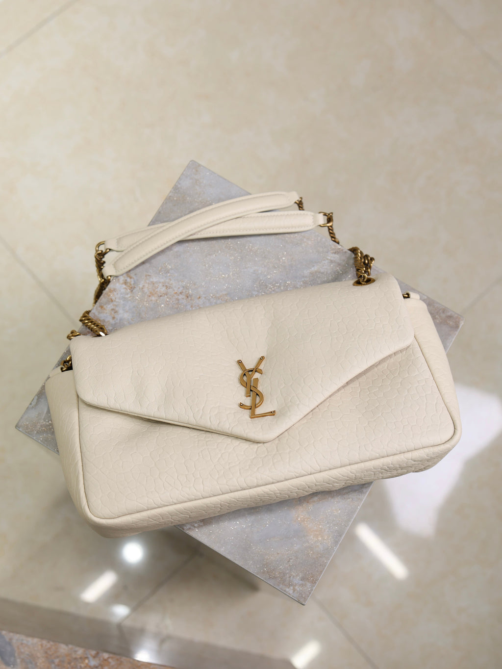 YSL 25S CALYPSO 30 IN IVORY GRAINED CALFSKIN GOLD HARDWRE