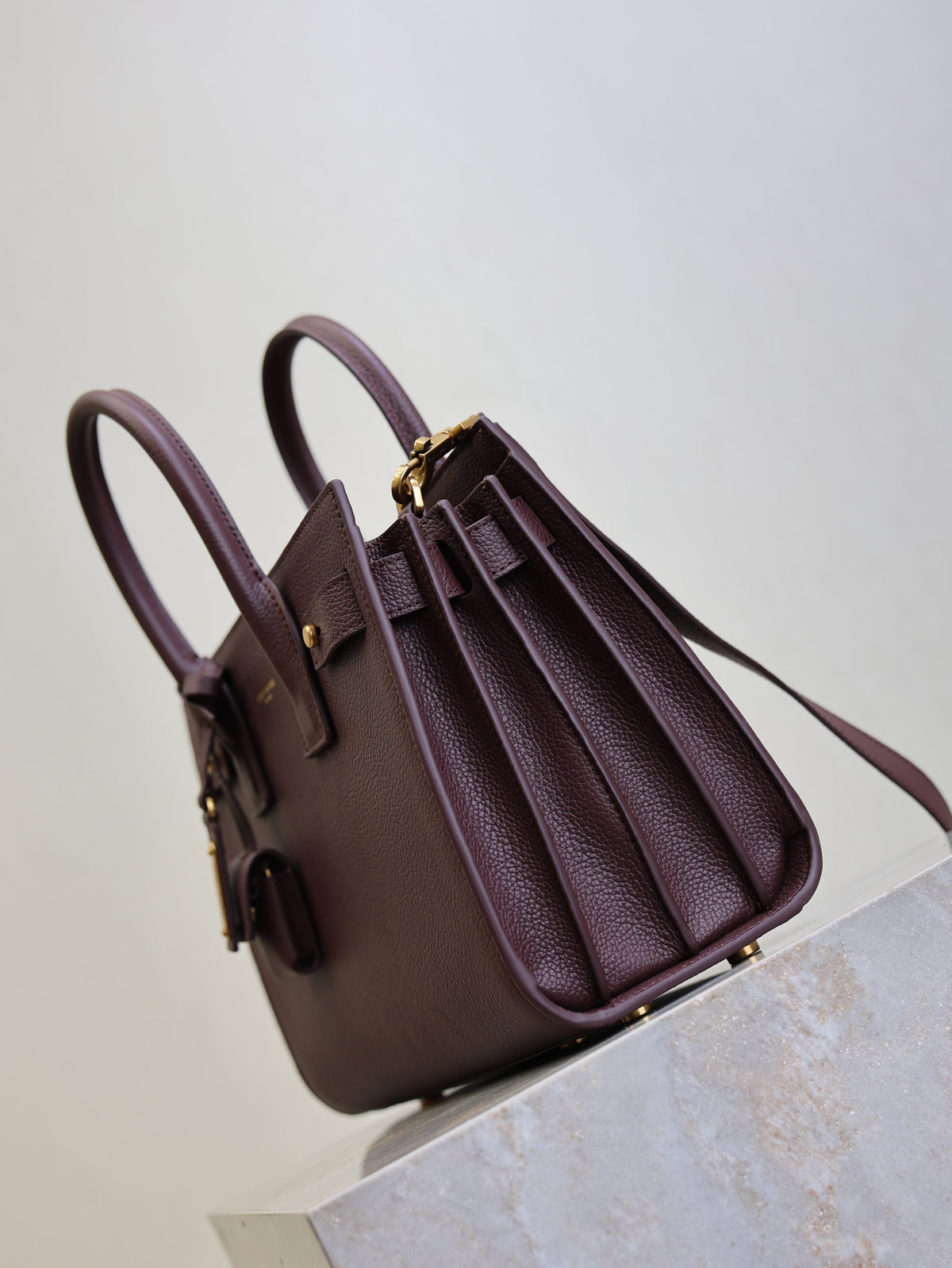 YSL 25S SAC DE JOUR MM 26 IN ROUGE CABERNET SUPPLE GRAINED CALFSKIN