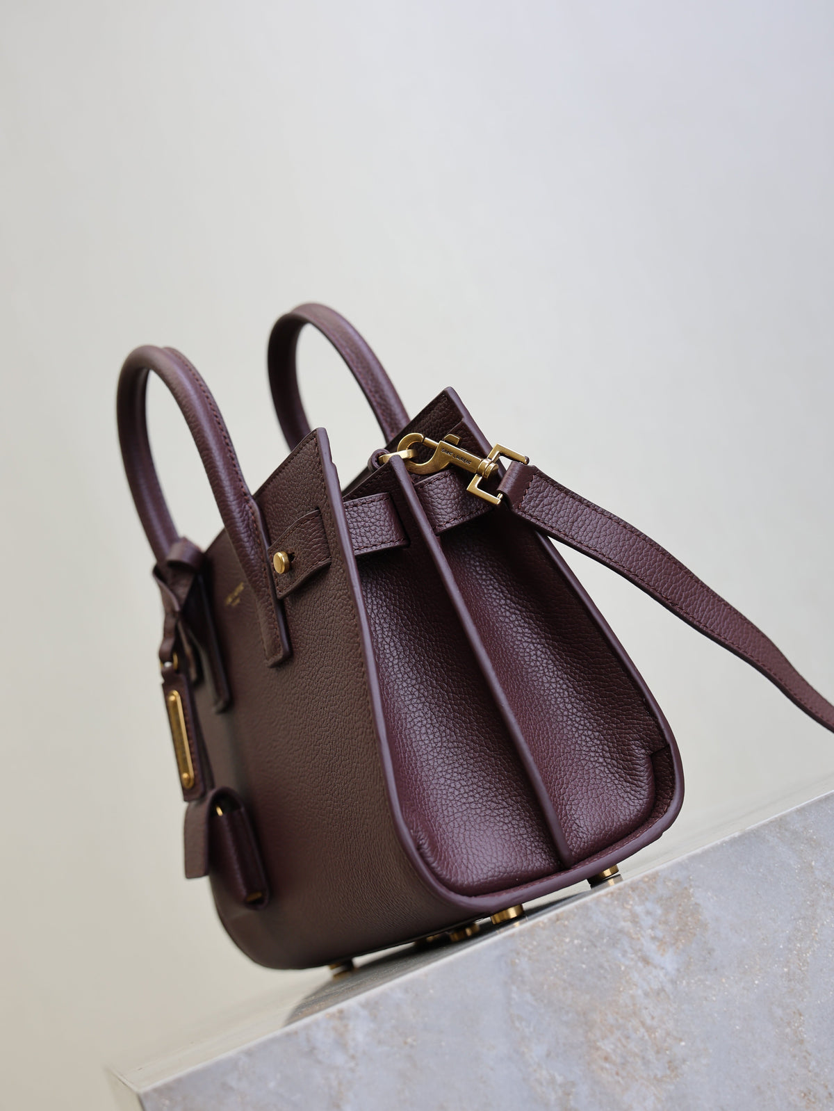 YSL 25S SAC DE JOUR 22 IN ROUGE CABERNET SUPPLE GRAINED CALFSKIN