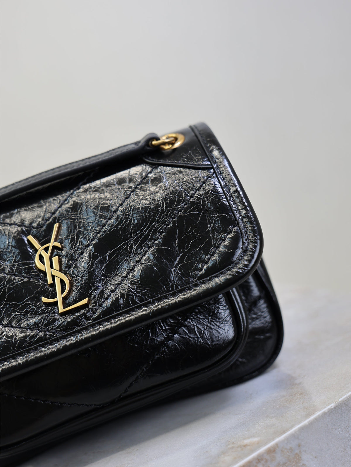 YSL 25S NIKI BAG 18 IN BLACK GLOSSY CALFSKIN GOLD HARDWRE