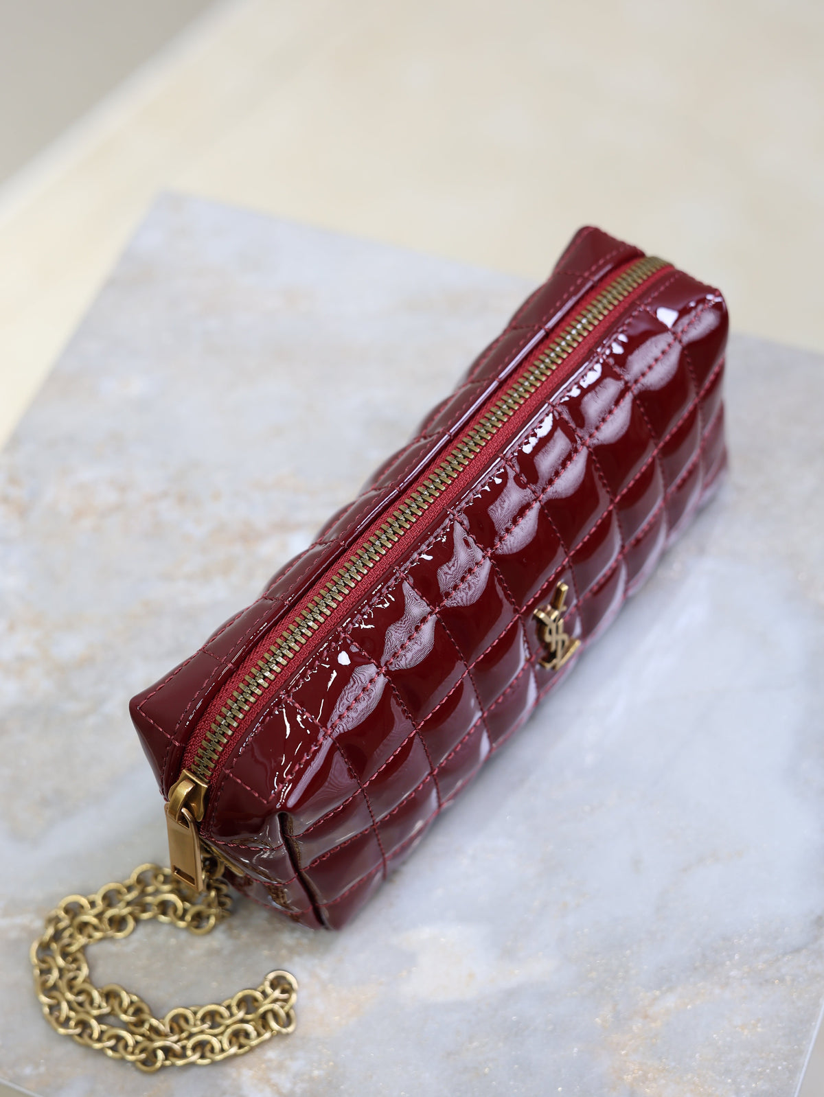 YSL 25S CASSANDRE MATELASSÉ CARRÉ POUCH ON CHAIN 18 IN DARK RED WINE SHINY CALFSKIN