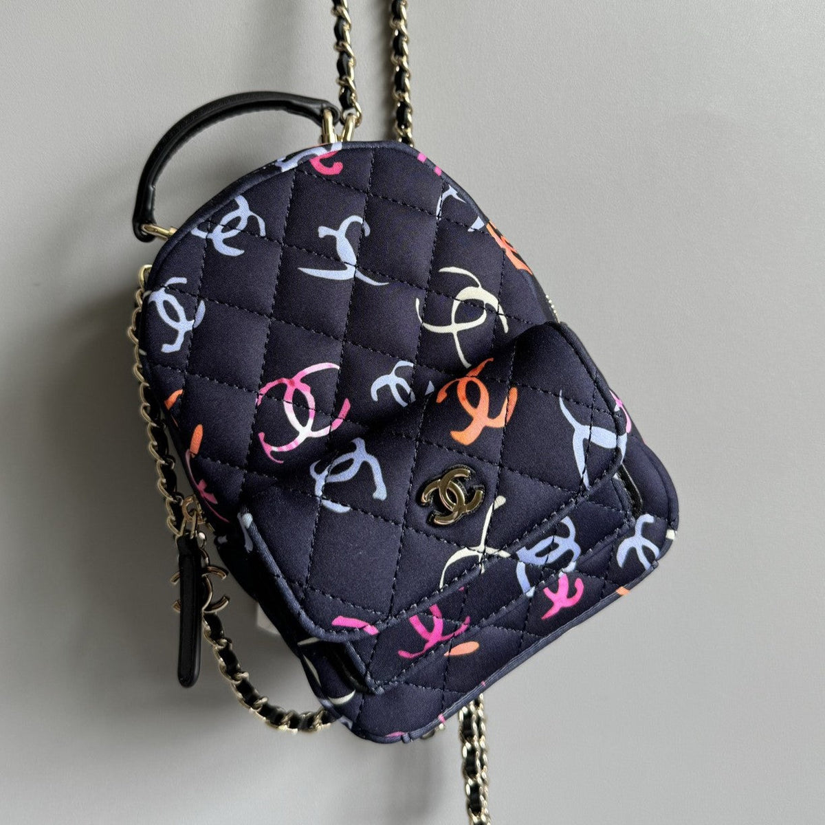 CHANEL BACKPACK 18CM BLACK & MANY OTHER COLORS PRINTED FABRIC GOLD HARDWARE