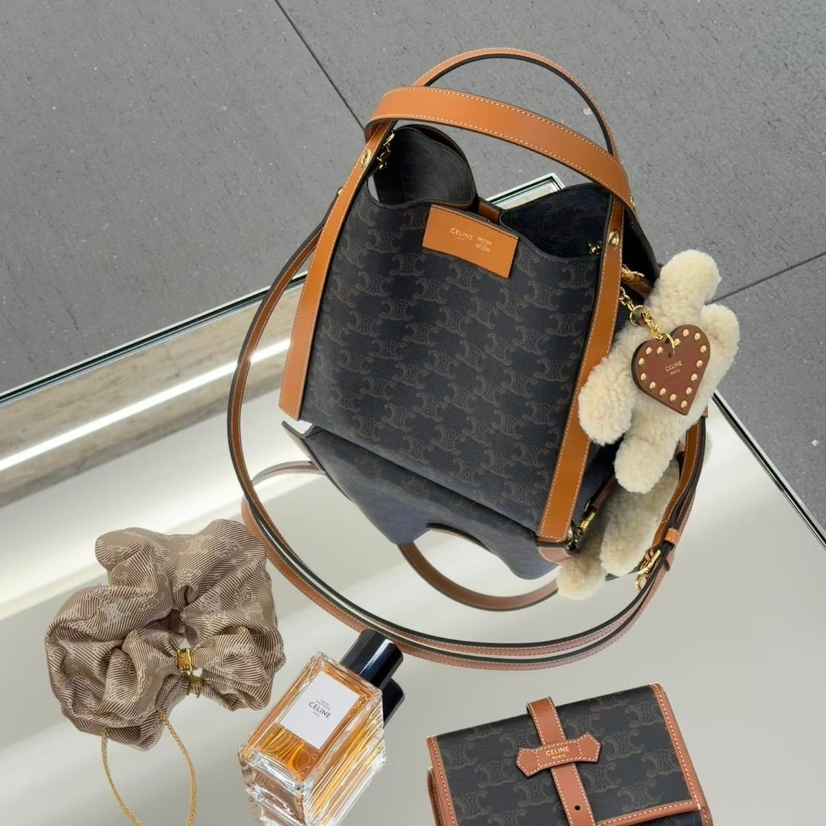 CELINE 25S SMALL CUBE BAG 21MM IN BLACK TRIOMPHE CANVAS AND BORWN CALFSKIN