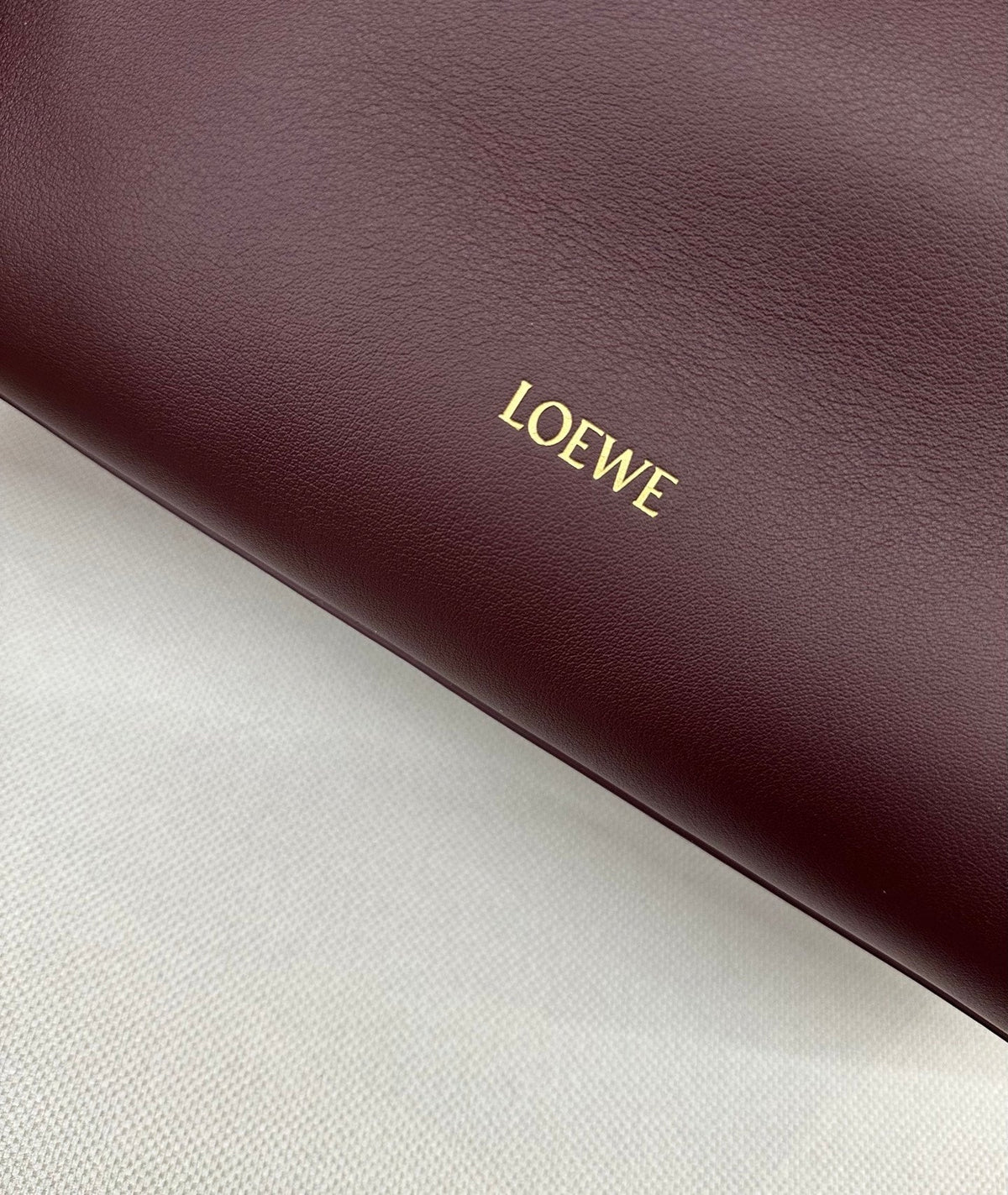 LOEWE 25S MADRID BAG 28 IN DARK WINE CALFSKIN GOLD HARDWARE