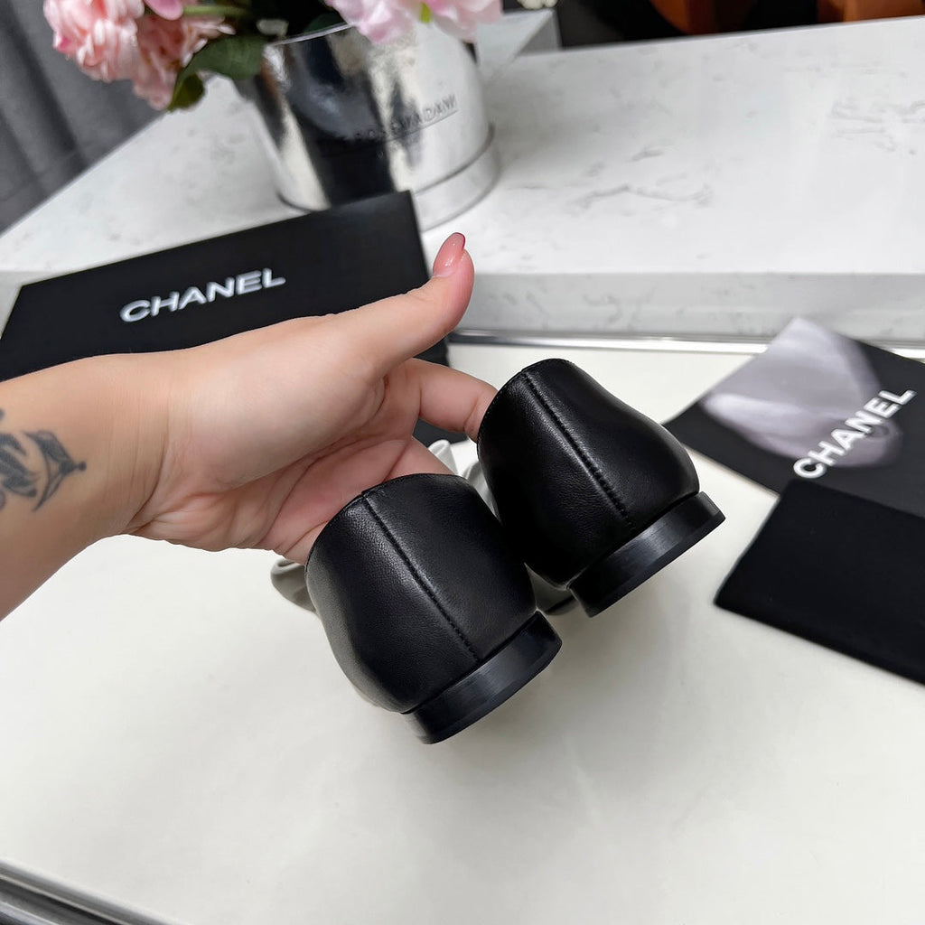 CHANEL 25S MARY JANES IN BLACK CALFSKIN WITH WHITE BOW GOLD HARDWRE