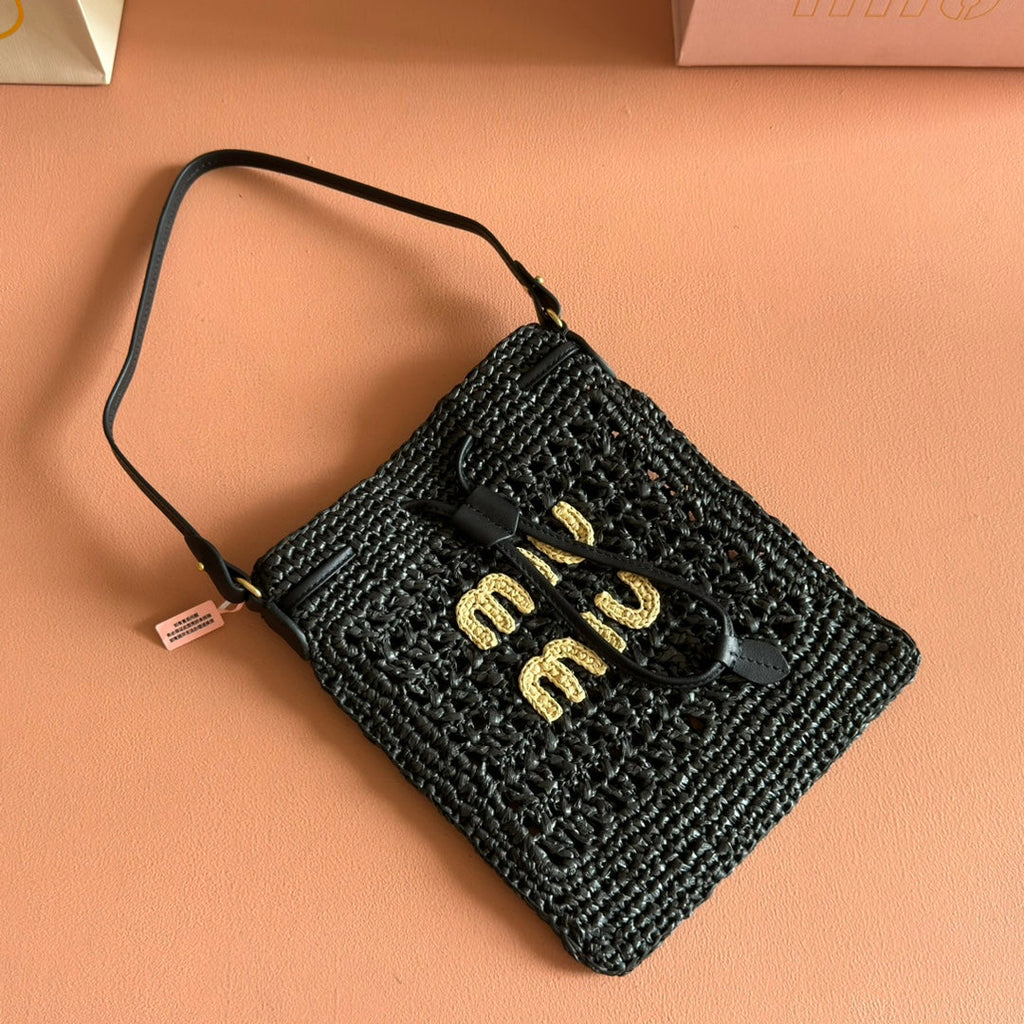 WANDER BUCKET BAG 23 BLACK IN RAFFIA WITH LEATHER TRIM
