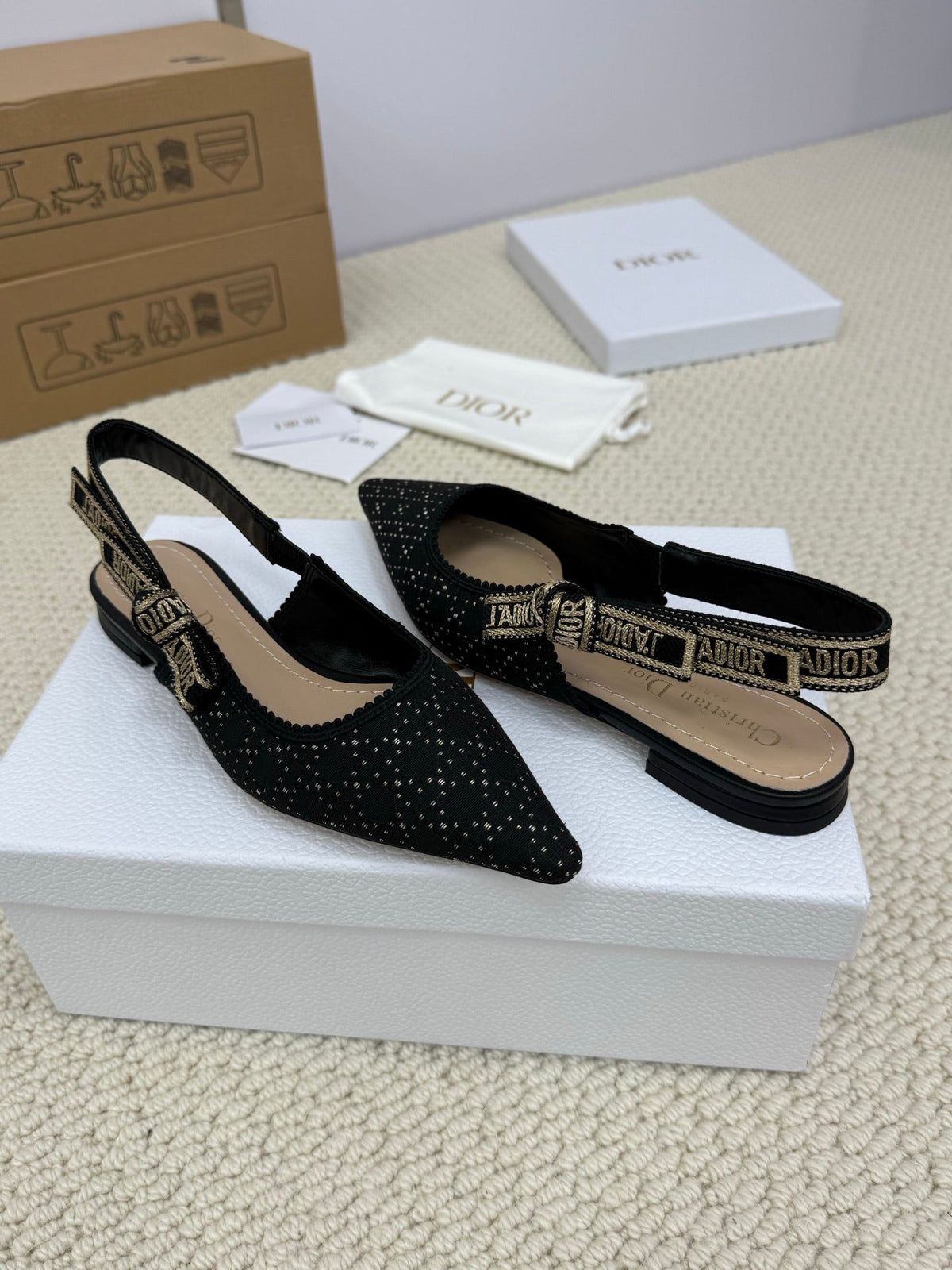 DIOR FLAT SLINGBACK 25S IN BLACK FABRIC AND BRAND NAME EMBROIDERY