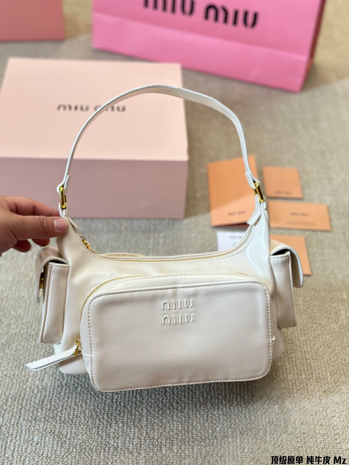 PUCKET BAG IN WHITE CALFSKIN