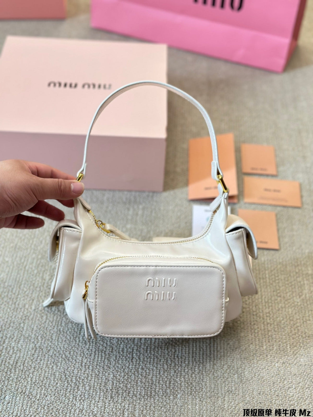 PUCKET BAG IN WHITE CALFSKIN