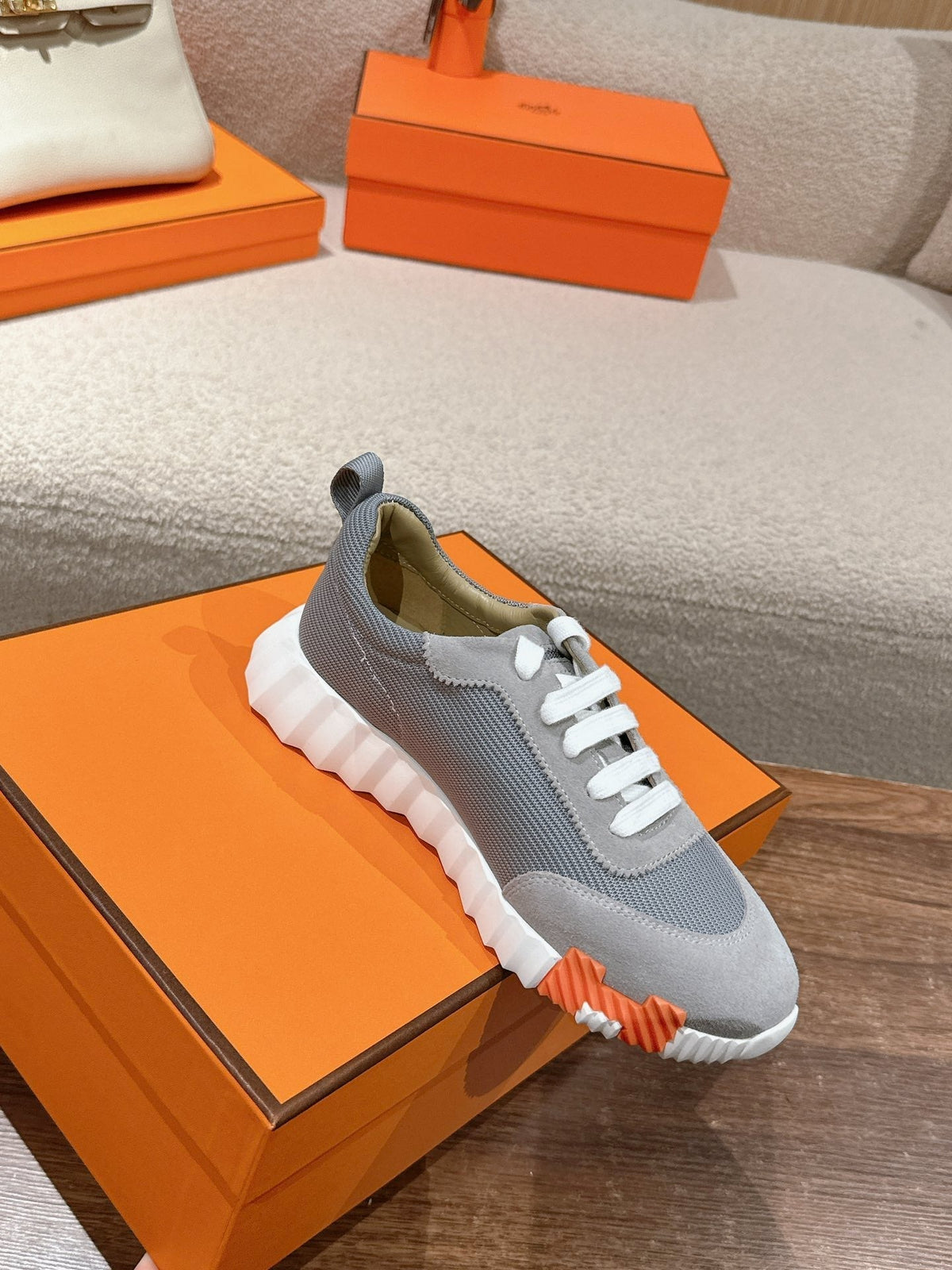 HERMES MAINLAND SNEAKER IN ASH GRAY SUEDE AND SHARK GRAY BREATHABLE MESH FABRIC