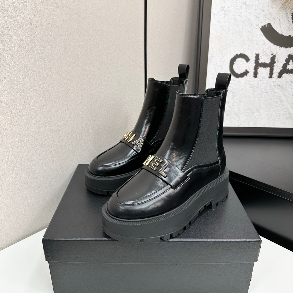 CHANEL 25S SHORT BOOTS IN BLACK CALFSKIN AND CANVAS
